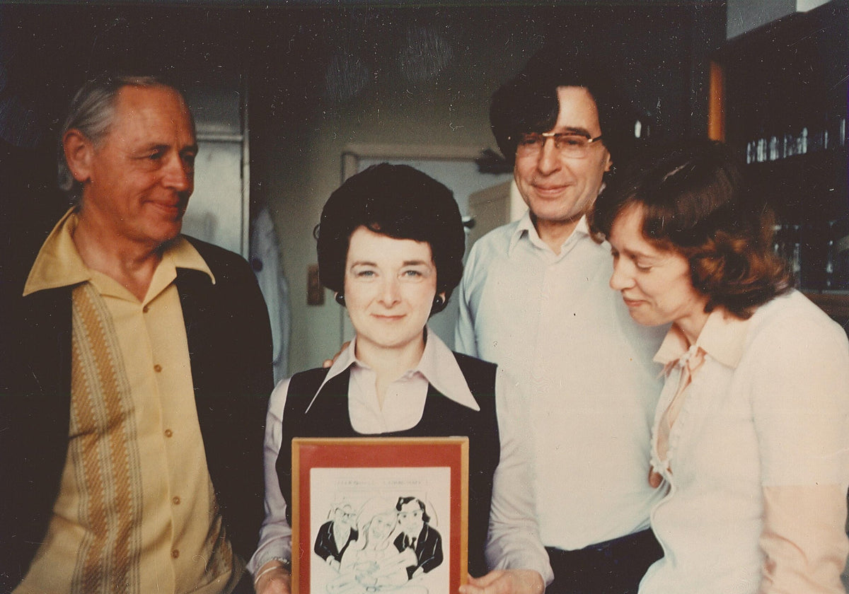 October 1978: Bunny Austin, Barbara Rankin, Robert Edwards and Jean Purdy. Barbara holds a cartoon about Louise Brown's birth, drawn by Alan Handyside.